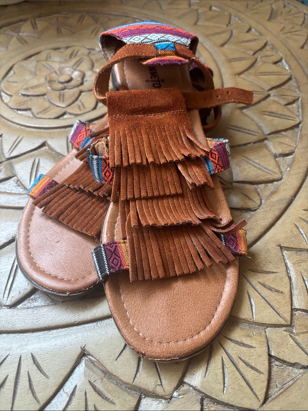 Minnetonka Fringed Suede Women’s Sandals with Woven Accents